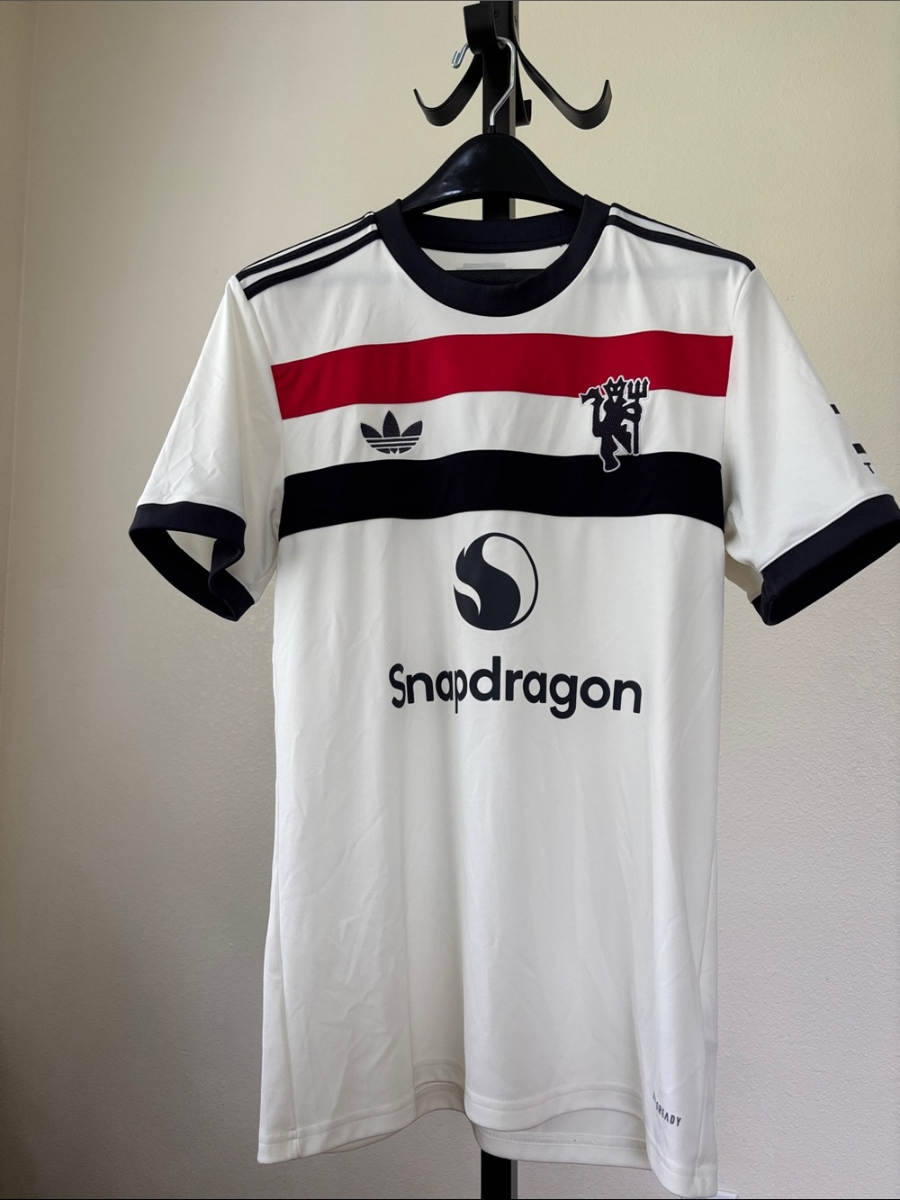 adidas Manchester United White Soccer Jersey with Red and Black Chest Stripes